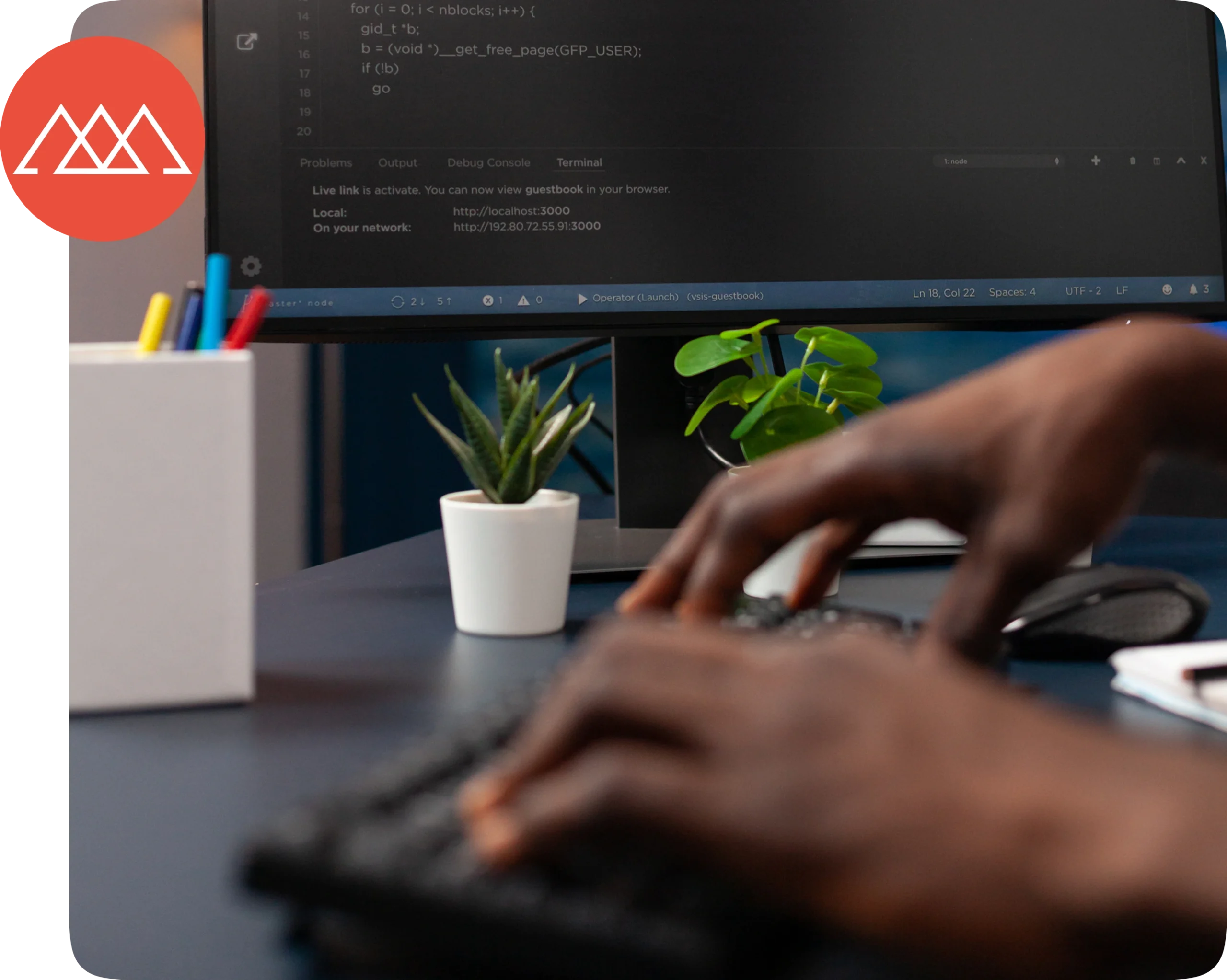 Hands typing at a desk with a code editor on screen, illustrating Campsite Solutions handling the technical work"